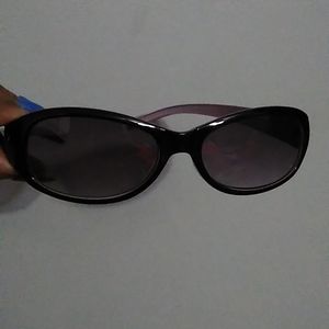 Plum, oval shaped Foster Grant sunglasses